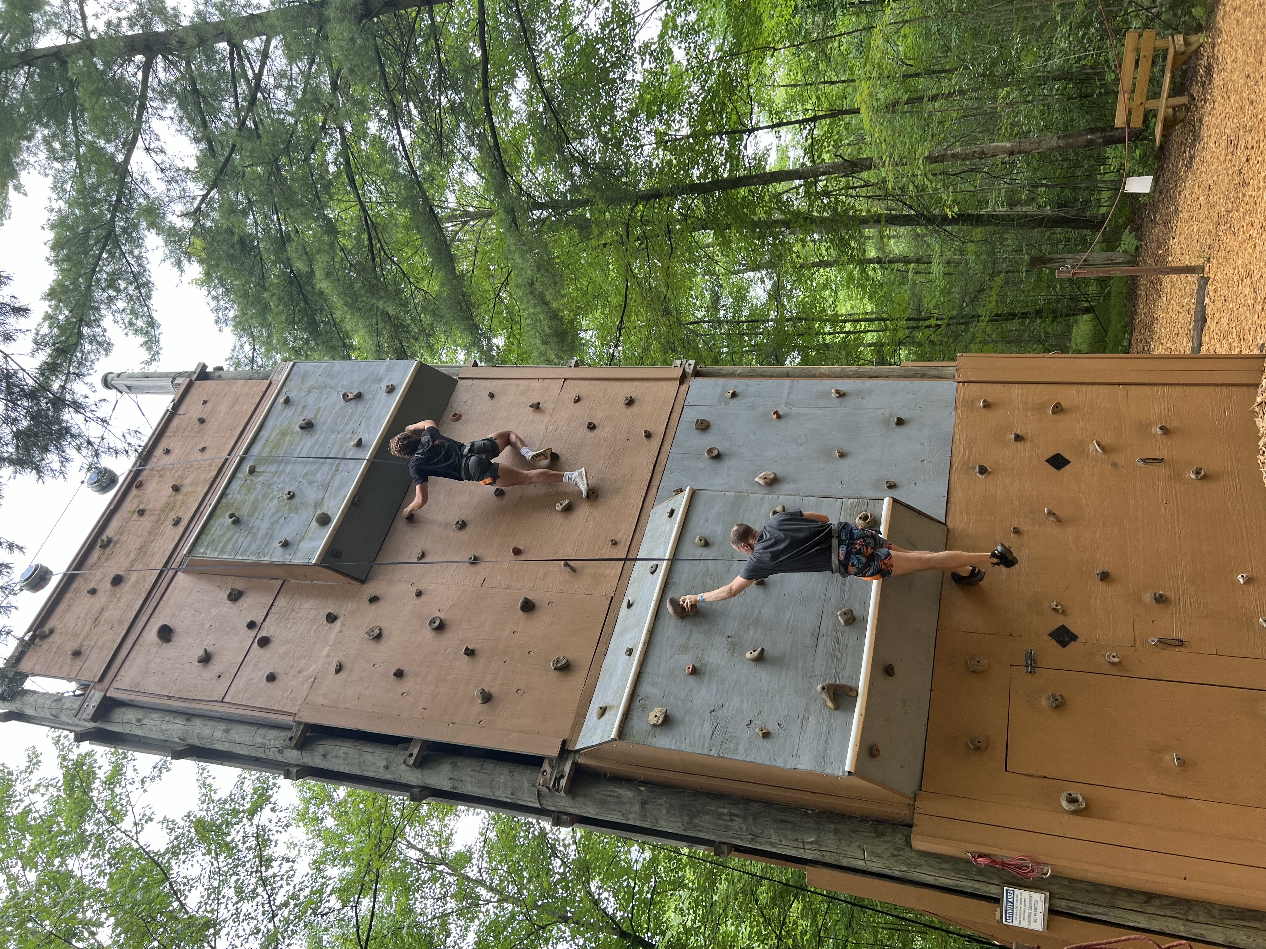 Rock Climbing - I enjoy rock climbing in my free time. Here's me racing my dad to the top of the wall.